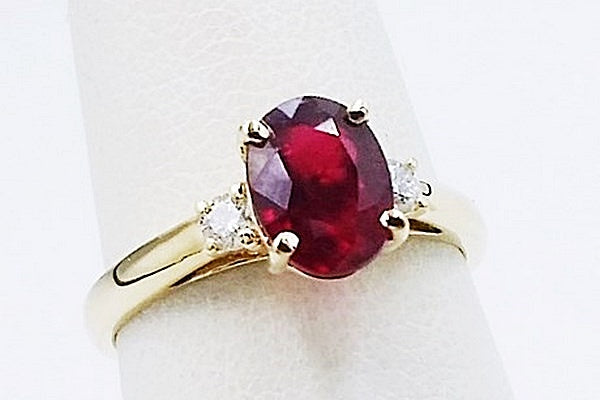 engagement ring set with a pigeon's blood colored ruby