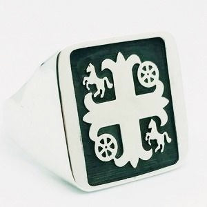 Silver signet ring engraved with family crest