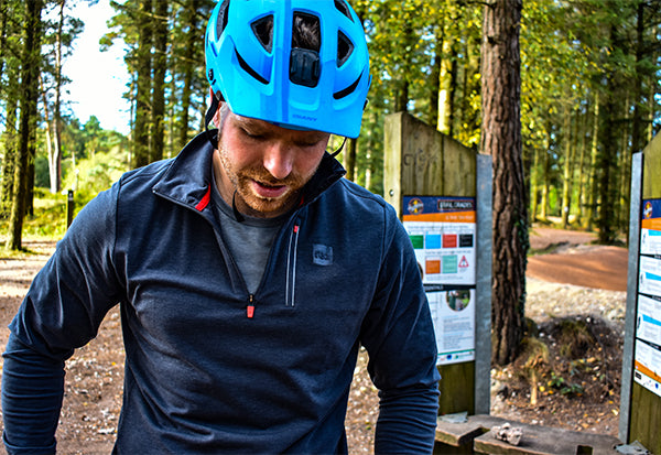 Man wears Long Sleeve Performance top whilst out biking 