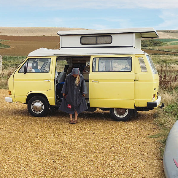 Woman Standing Outside her Campervan