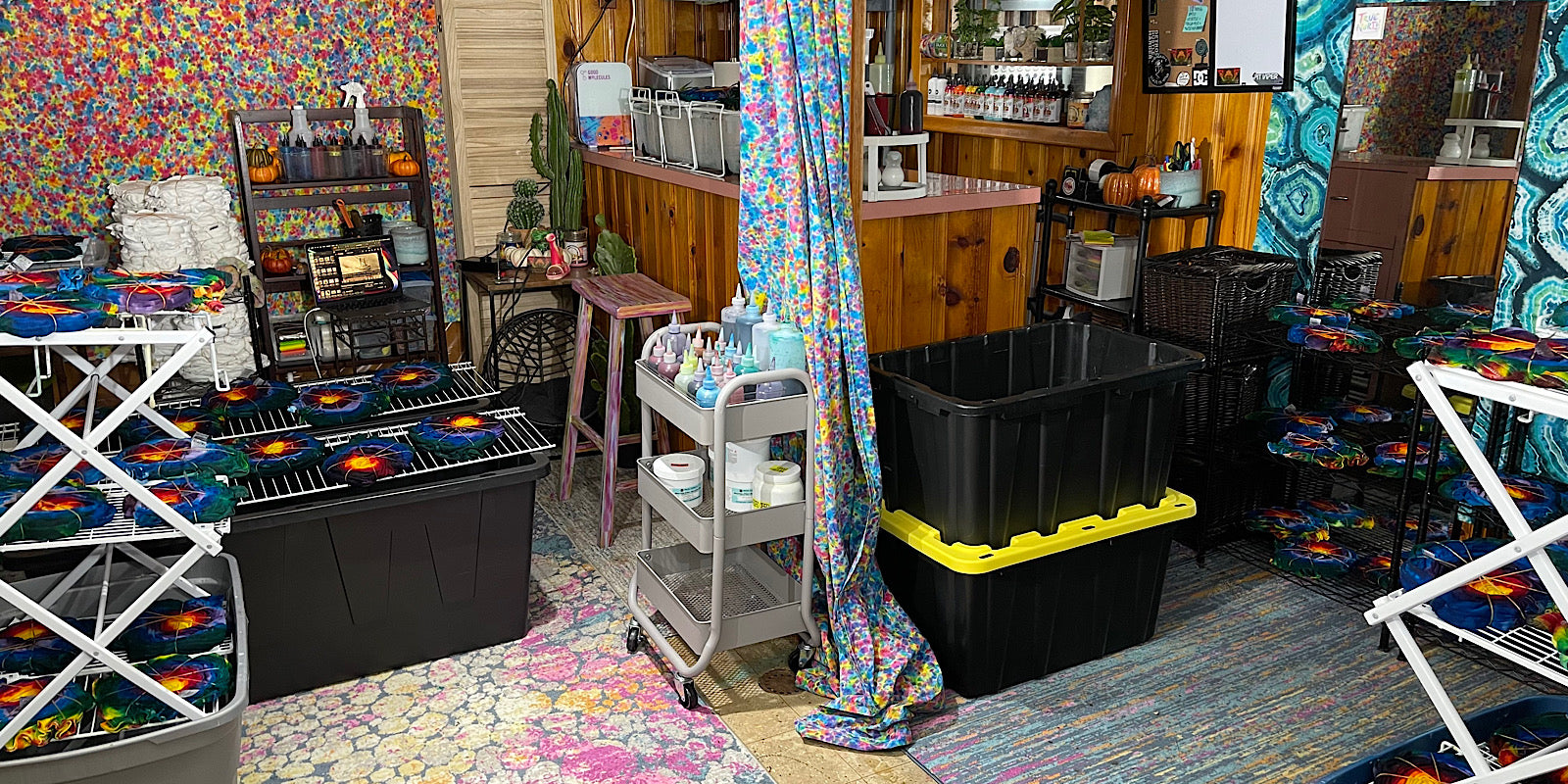 Another view of the tie dye bar & studio while a large custom order for over 200 rainbow tie dye shirts is in progress