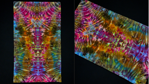 A standard/queen size abstract, symmetrical psychedelic mindscape ice tie dyed pillowcase featuring an array of rainbow shades with primarily pink