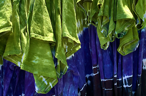 Few dozen green, purple & black ombre gradient tie dye short sleeve shirts, handmade for a custom request