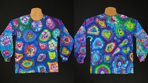 Front & back side of a size large long sleeve tie dye shirt featuring a dreamy blue base with pink, purple & neon like green geode patterning that boasts a totally different pattern on each side