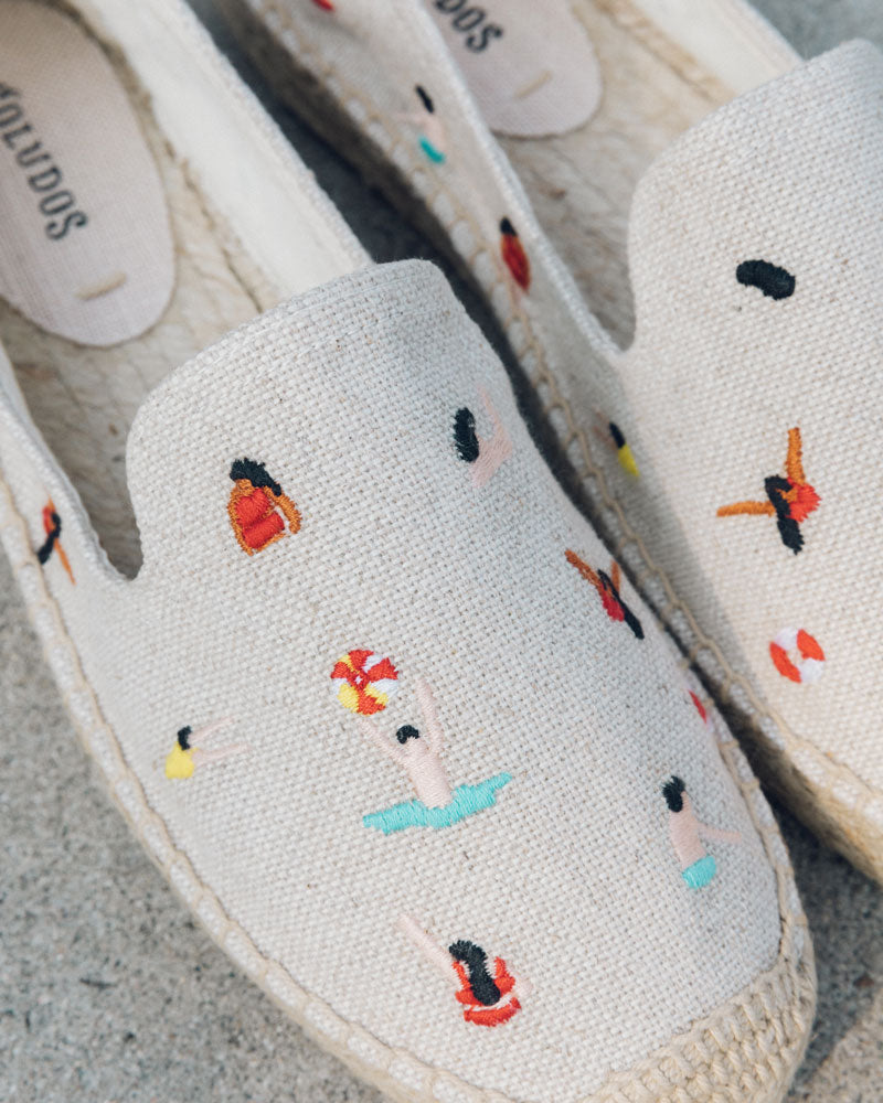 sneakers with swimmers on them
