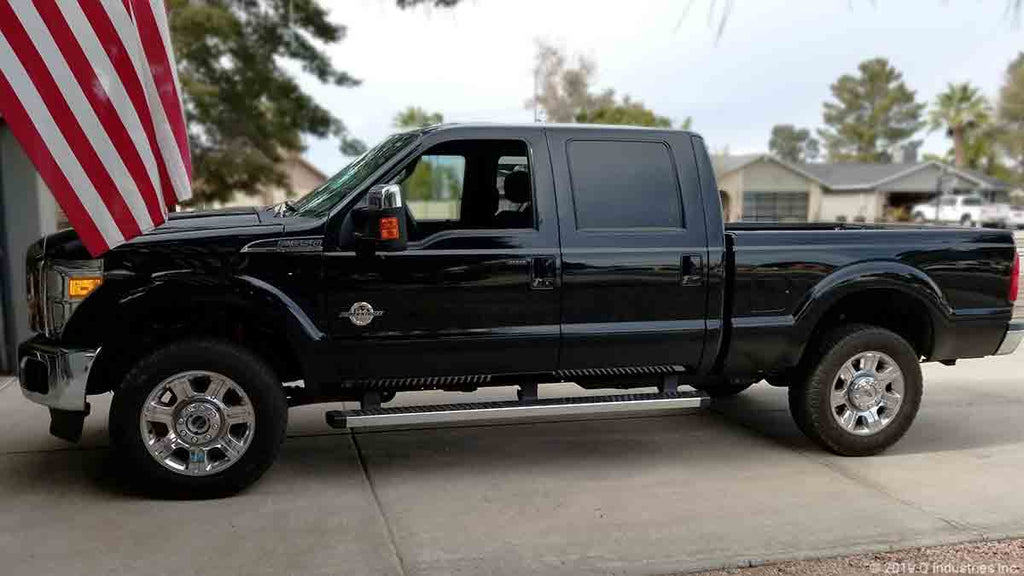 f350 superduty parked in drive with flag