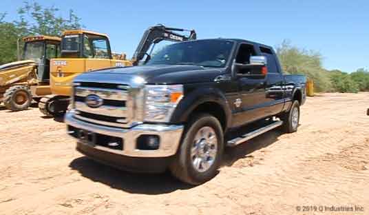 superduty black in dirt construction site