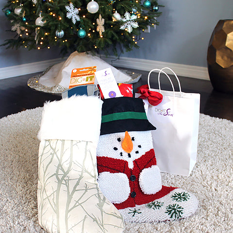 Christmas stocking with a pair of women's gardening gloves