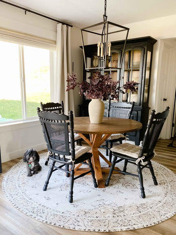 https://cdn.shopify.com/s/files/1/2594/4244/files/helena-round-dining-pets-insitu_480x480.jpg?v=1684206932