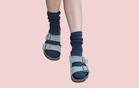 black socks with grayish sandals