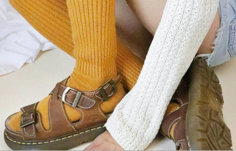 yellow color socks with brown leather sandals