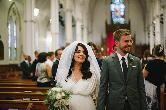 Geoff and Anabela walking down the aisle