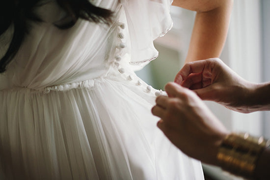 Button detail on Anabelas wedding dress