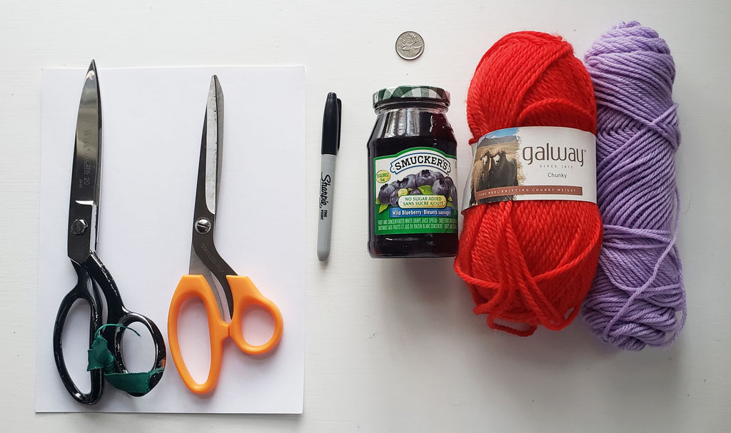 Supplies for making a pom pom