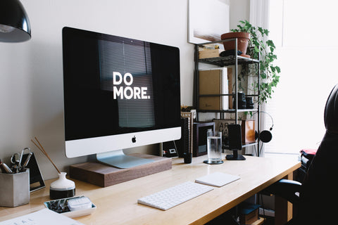 Home computer with do more written on the screen