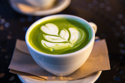 Cup of matcha tea with latte art