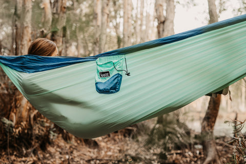 Person relaxing in a hammock