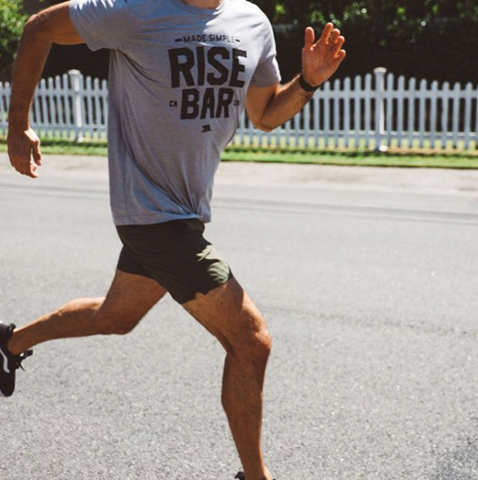 Man running in Rise Bar Shirt