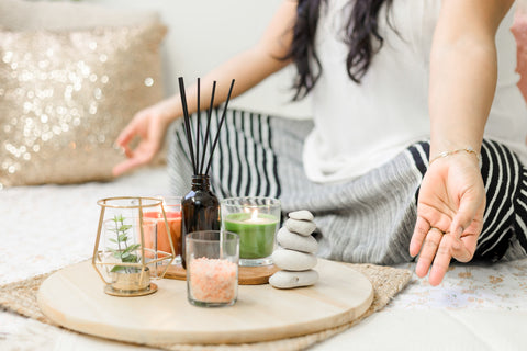 Woman sitting in a meditation pose