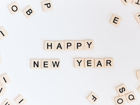 Scrabble tiles reading happy new year