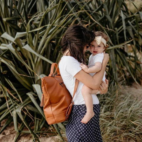 Nappy bag that transforms into a backpack