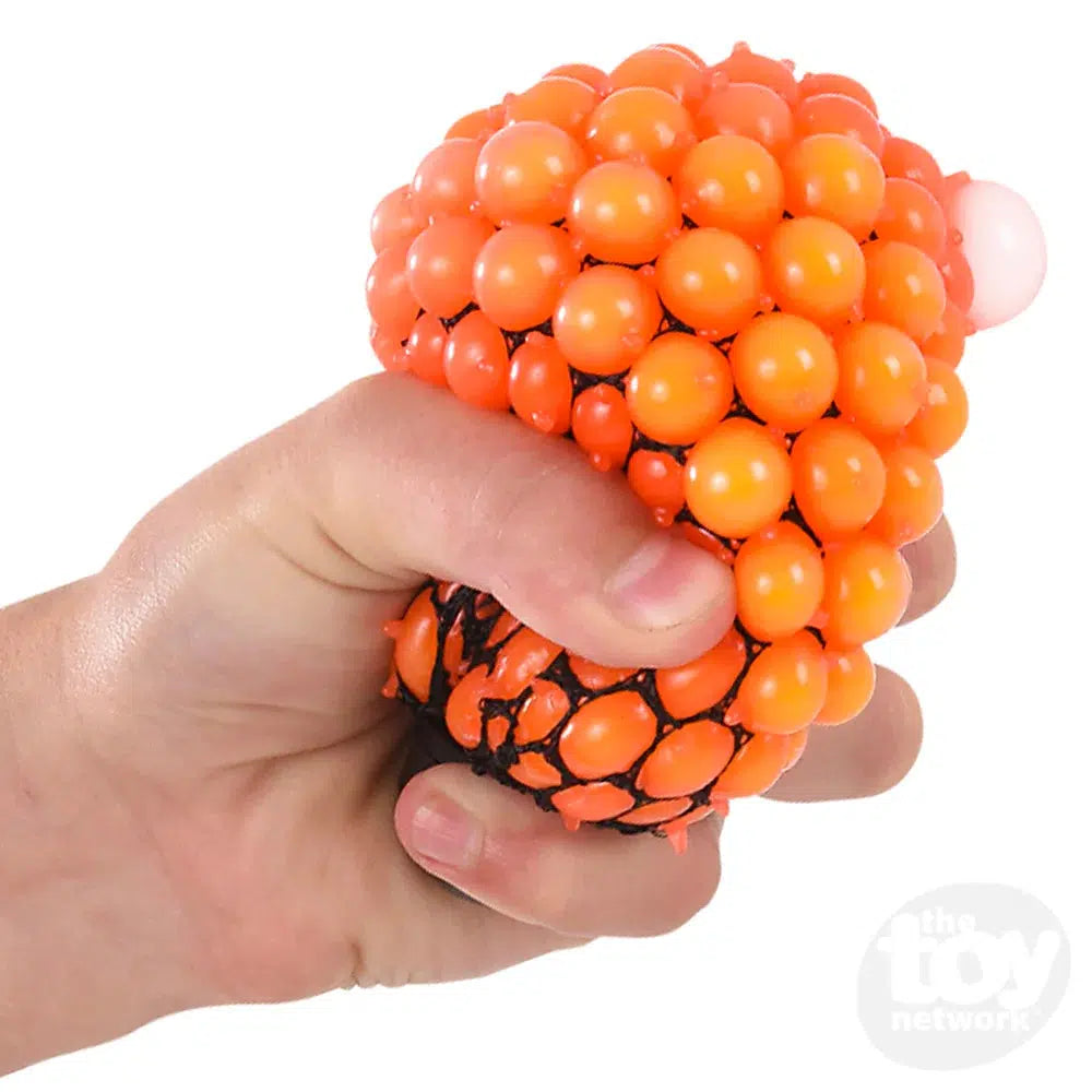 https://cdn.shopify.com/s/files/1/2598/1878/files/the-toy-network-2-squeeze-grape-ball-legacy-toys.webp?v=1685716277