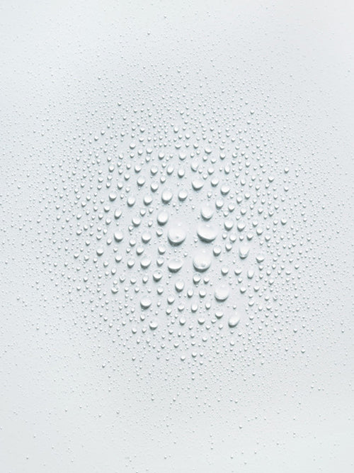 water droplets on grey surface