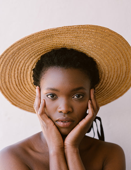 Lady in sun hat