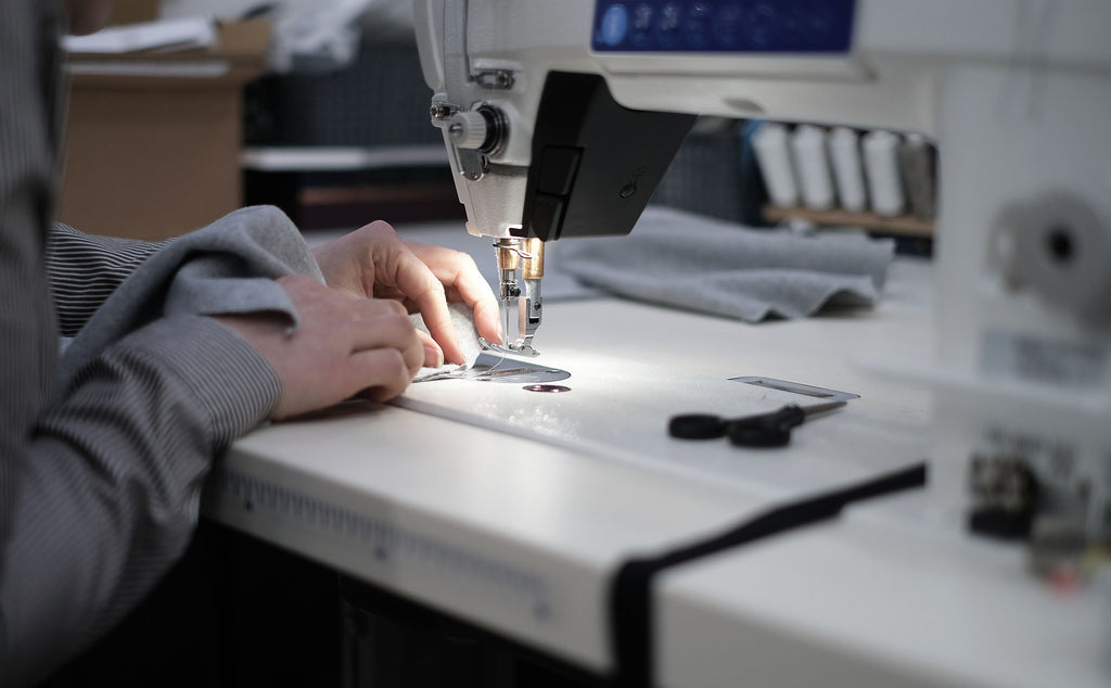 a human making a whippet coat