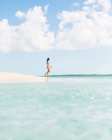 Girl Walking on Beach