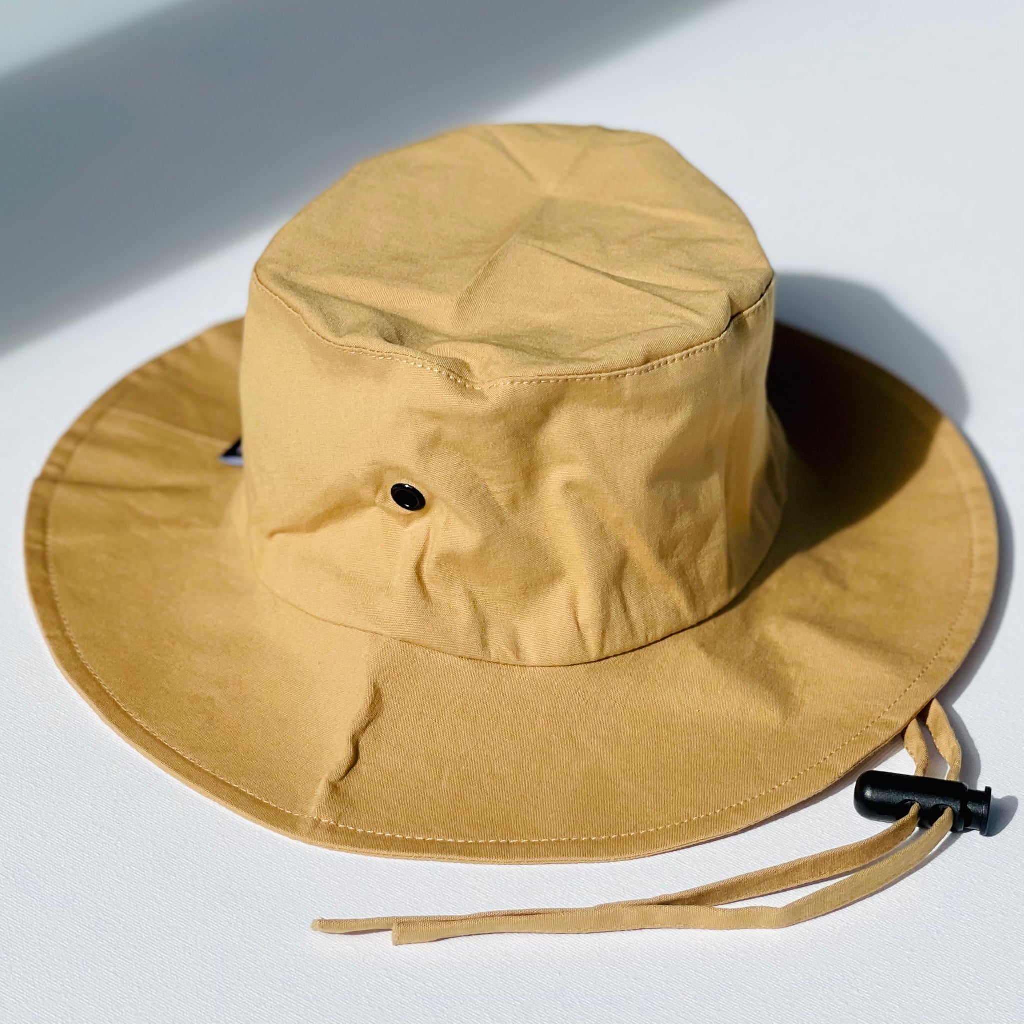 gold floppy hat