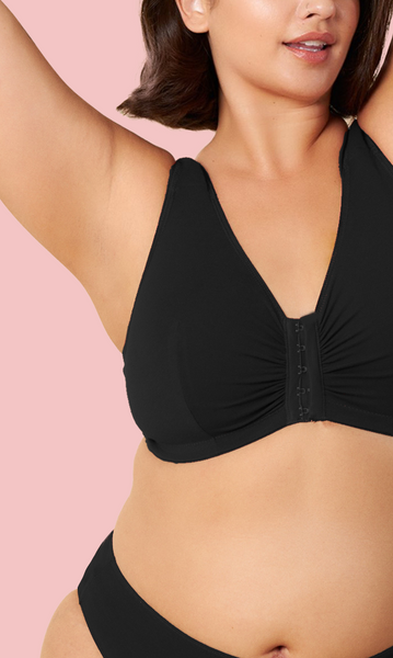 woman smiling wearing black front closure bra