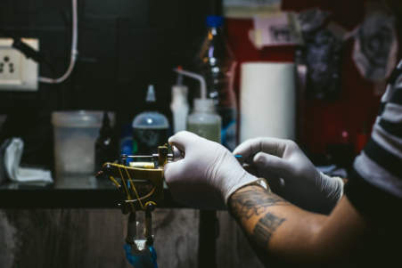 tattoo artist in studio