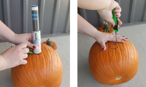 Cutting hole for a smoke bomb to be placed in the pumpkin