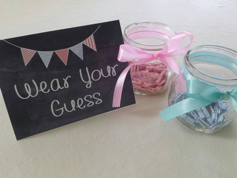 Wear your guess sign with pink and blue cloth clips