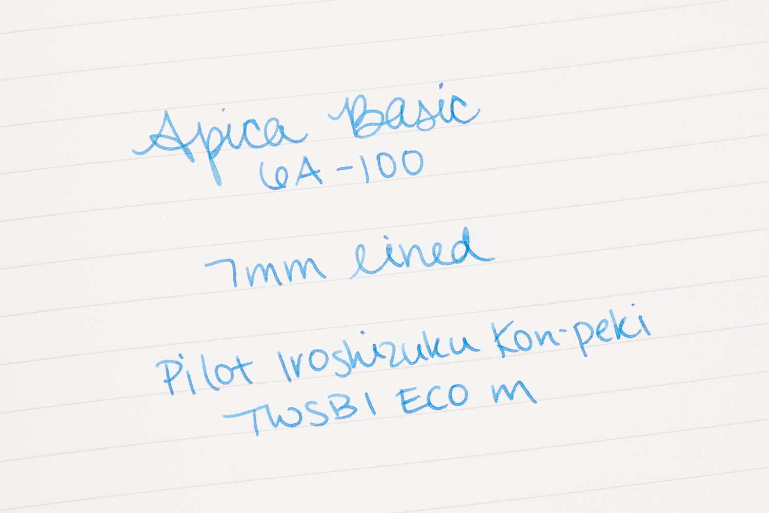 Writing sample in an open Apica Basic 6A-100 lined notebook