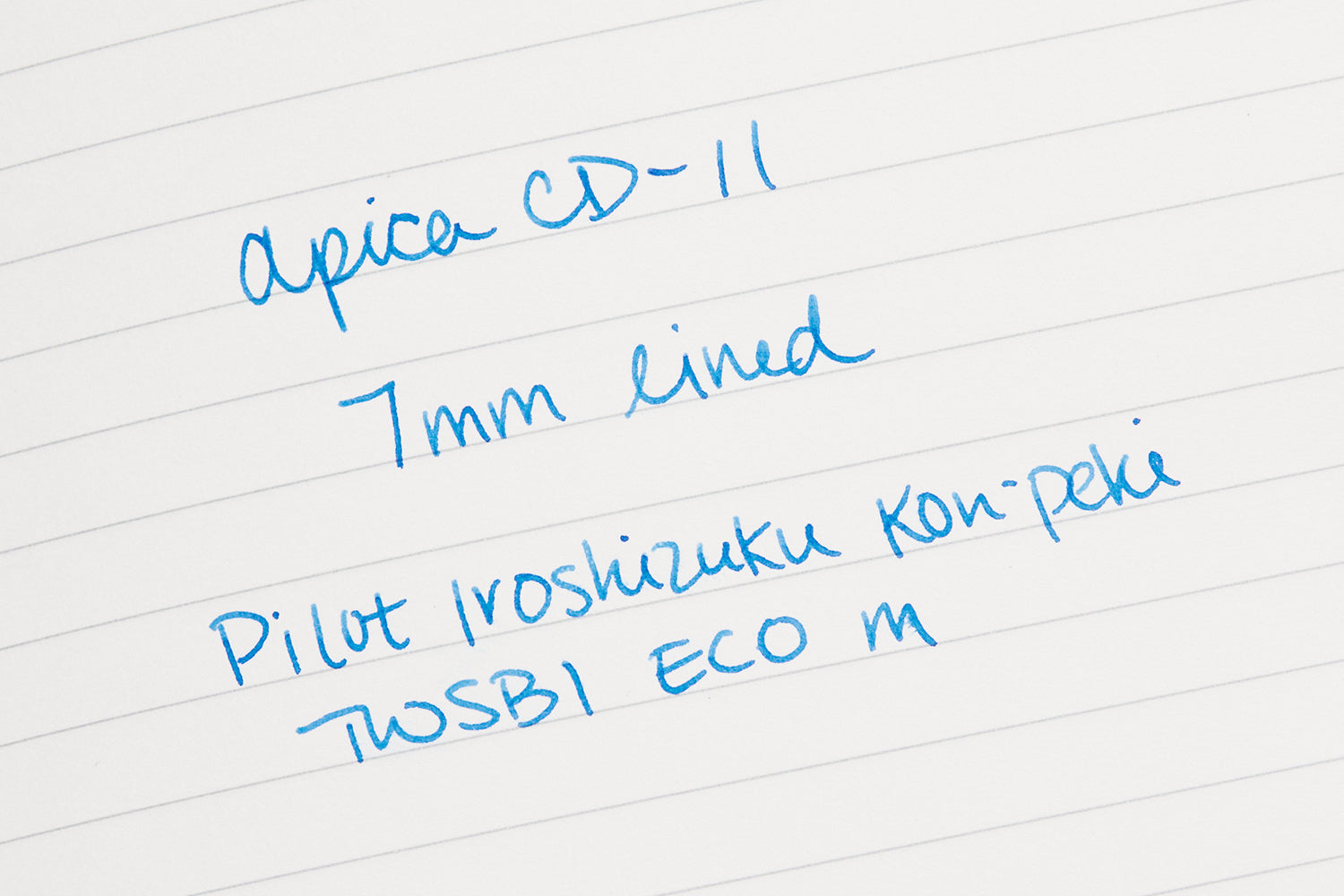 Writing sample in an open Apica CD-11 lined notebook