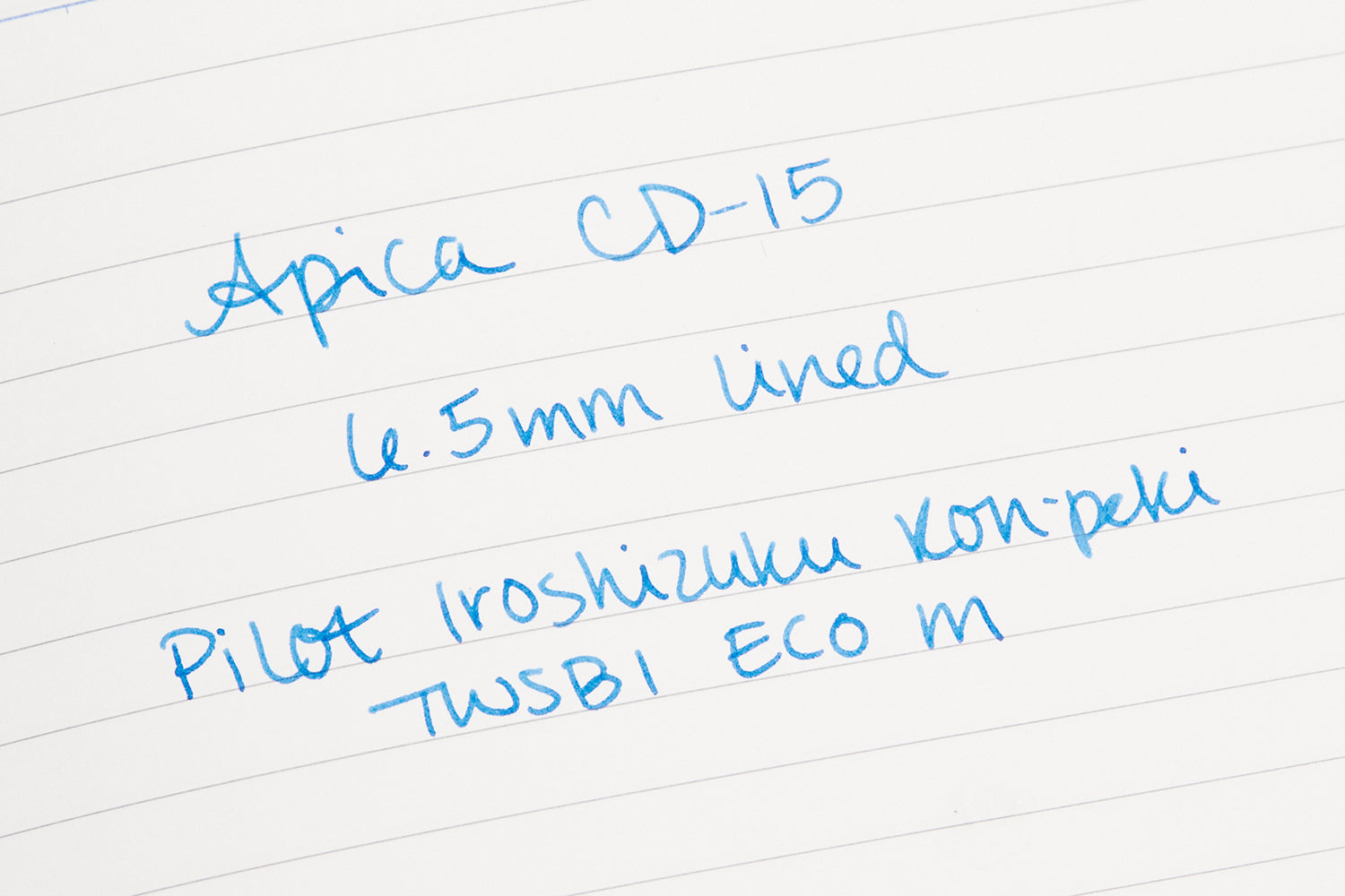 Writing sample in an open Apica CD-15 lined notebook