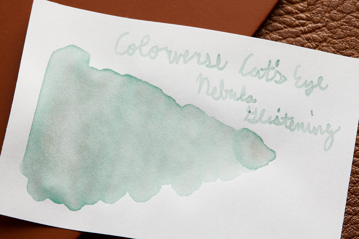 Colorverse Cat's Eye Nebula Glistening swab on white paper on desk background