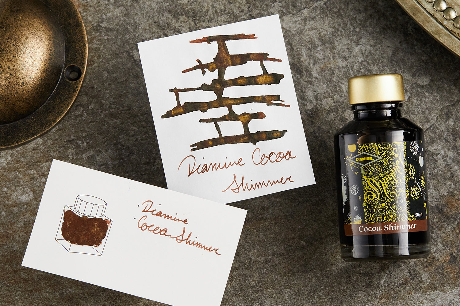 Diamine Cocoa Shimmer fountain pen ink bottle with swabs