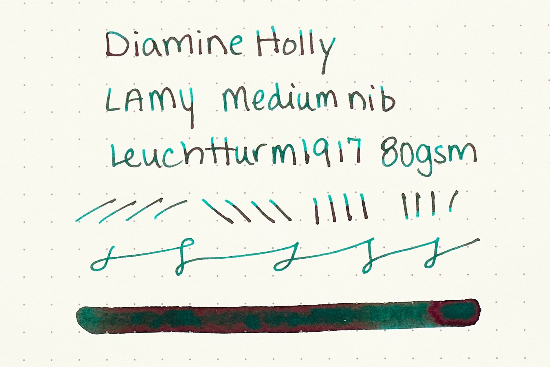 Diamine Holly Fountain Pen Ink writing sample on cream dot grid paper