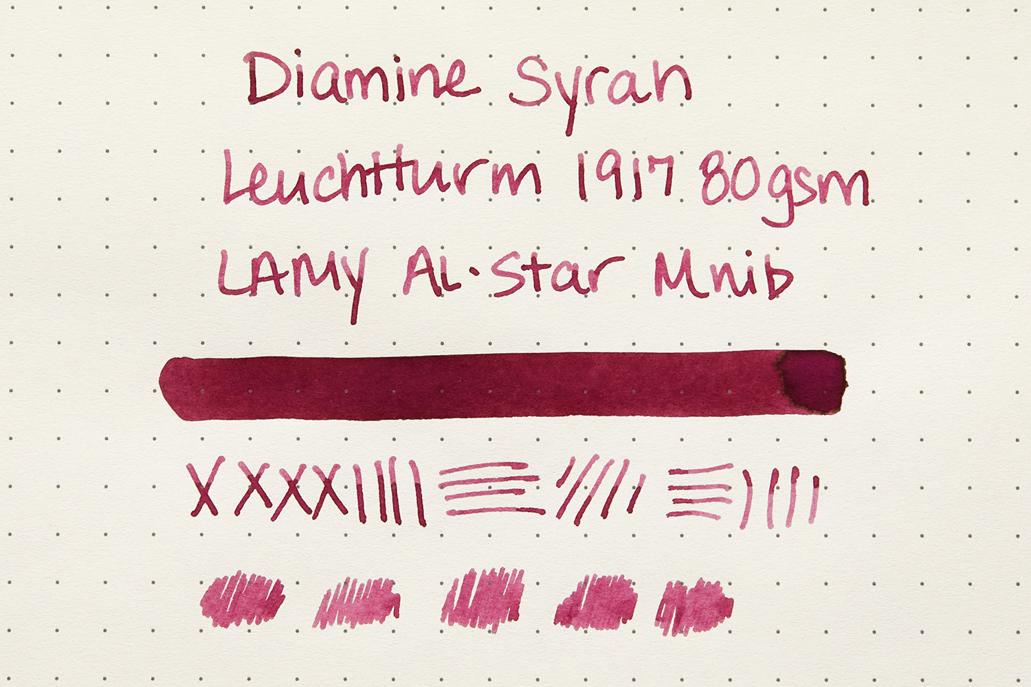 Diamine Syrah fountain pen ink writing sample on cream colored dot grid paper