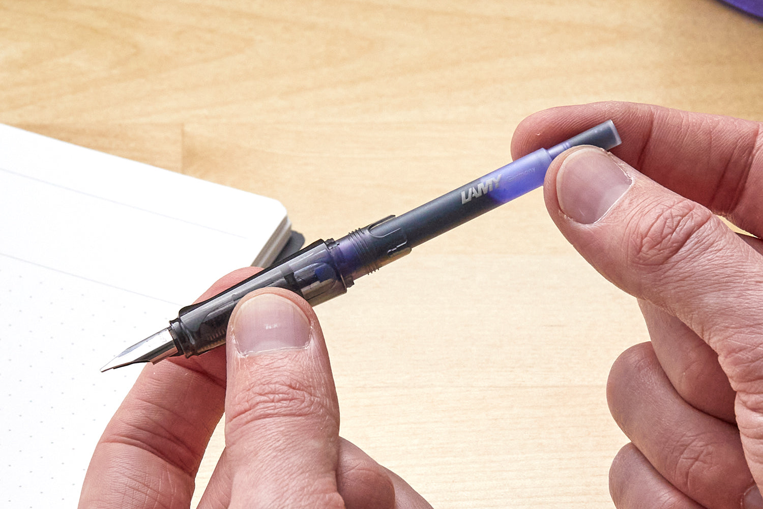 Installing an ink cartridge into a LAMY pen