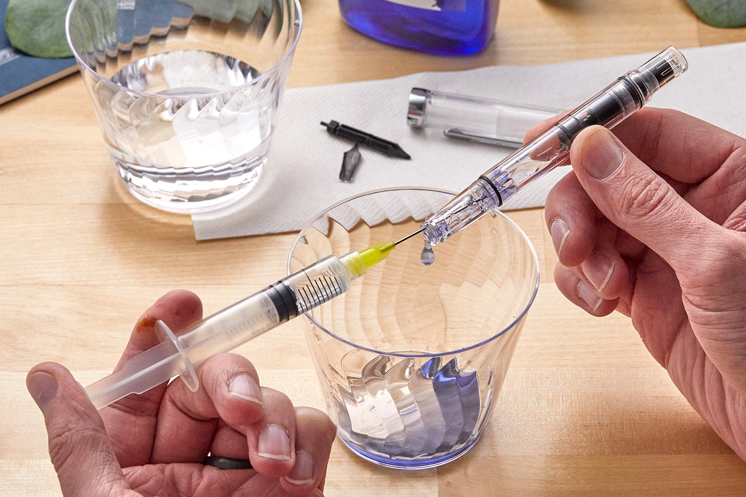 Using an ink syringe to clean out a fountain pen