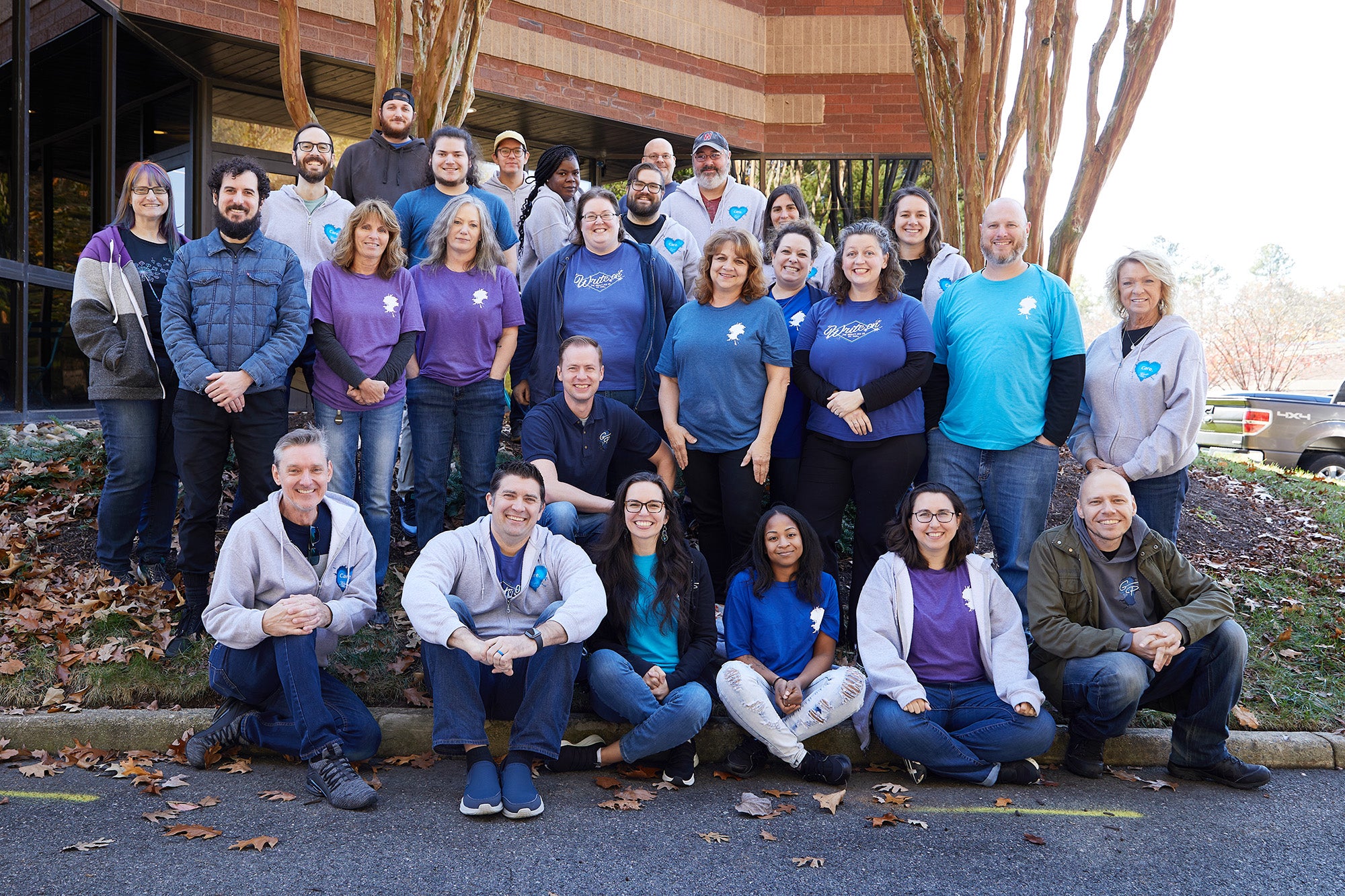 Team members of Goulet Pens smiling outside