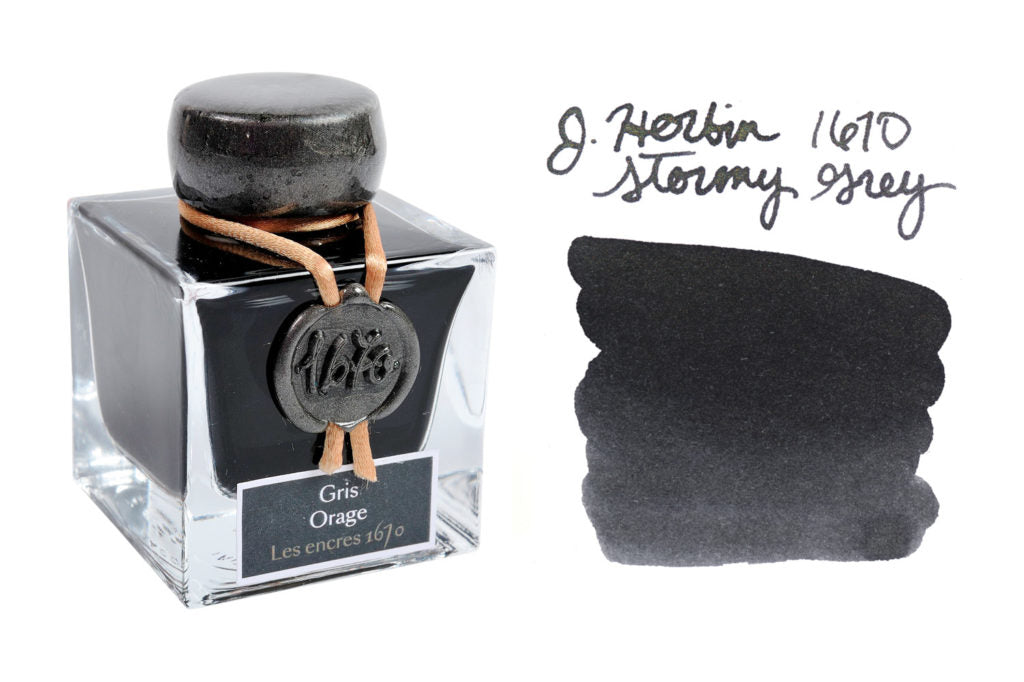 Jacques Herbin 1670 Stormy Grey fountain pen ink bottle with writing sample and swab