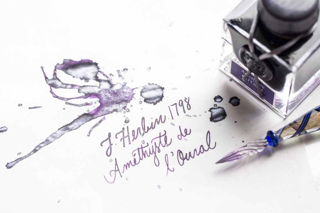 Jacques Herbin 1798 Amethyste de l'Oural fountain pen ink splatter with writing sample