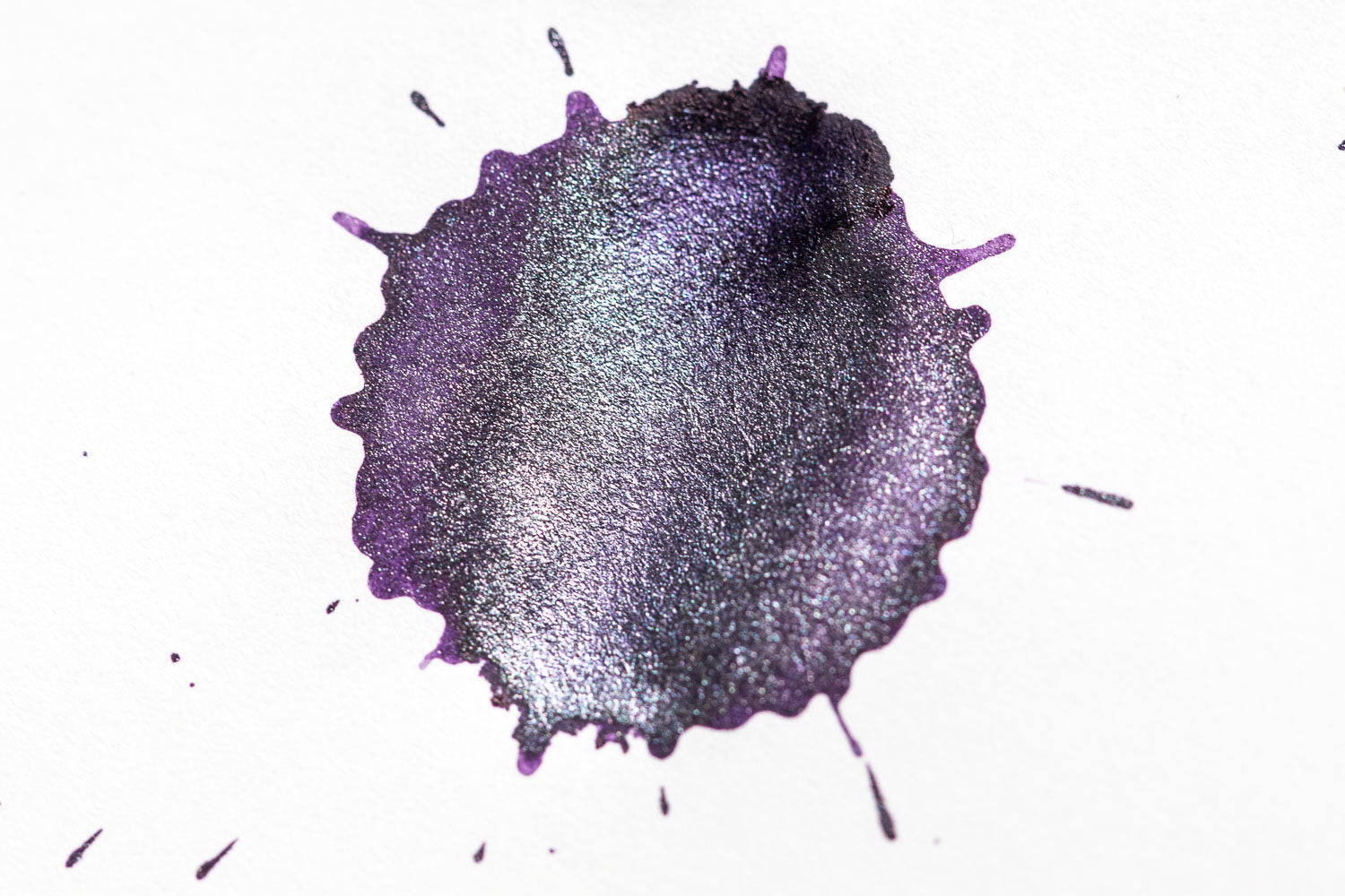 Jacques Herbin Amethyste de l'Oural fountain purple ink splatter on white paper