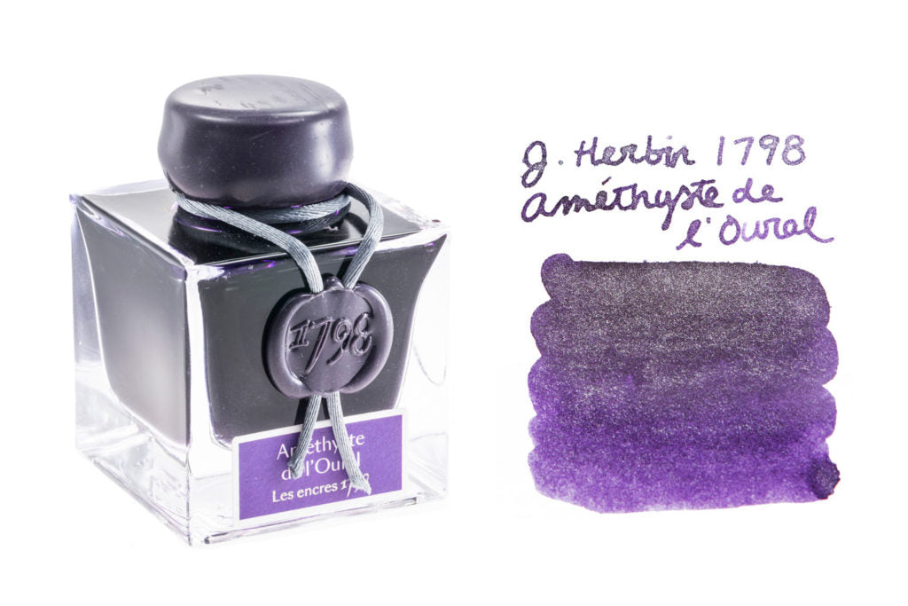 Jacques Herbin 1798 Amethyst de l'Oural fountain pen ink bottle with writing sample and swab