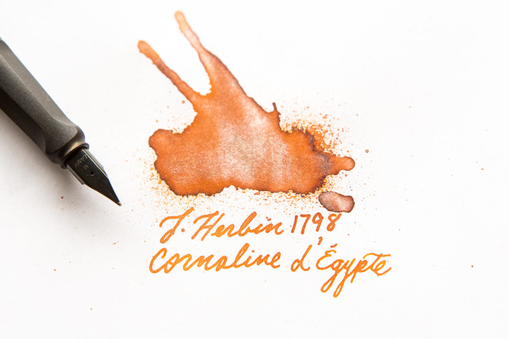 Jacques Herbin 1798 Cornaline d'Egypte ink splatter with LAMY safari fountain pen